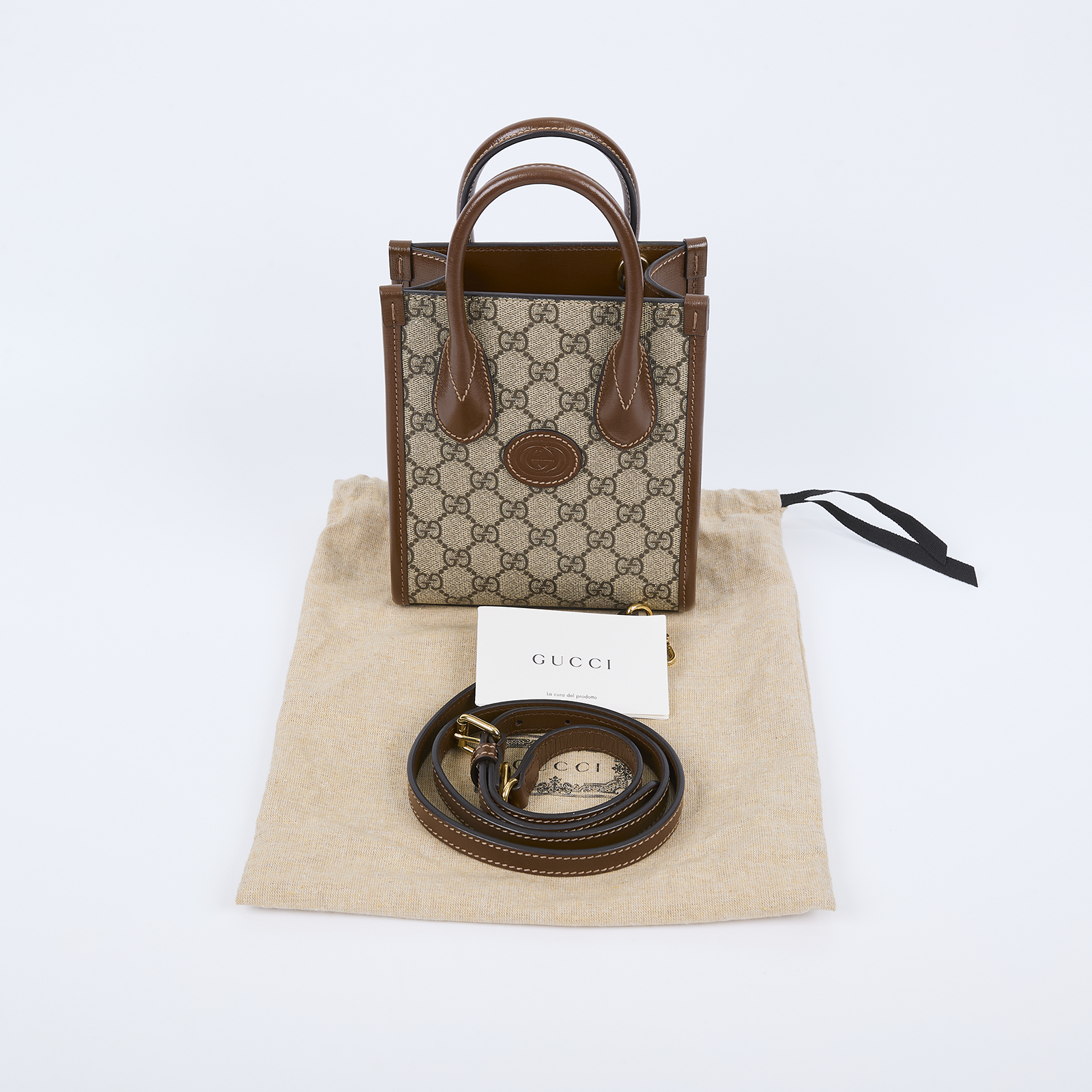 古馳 GUCCI Interlocking G 迷你 手提袋 671623 92TCG 咖INTERLOCKING琴譜包 防塵袋