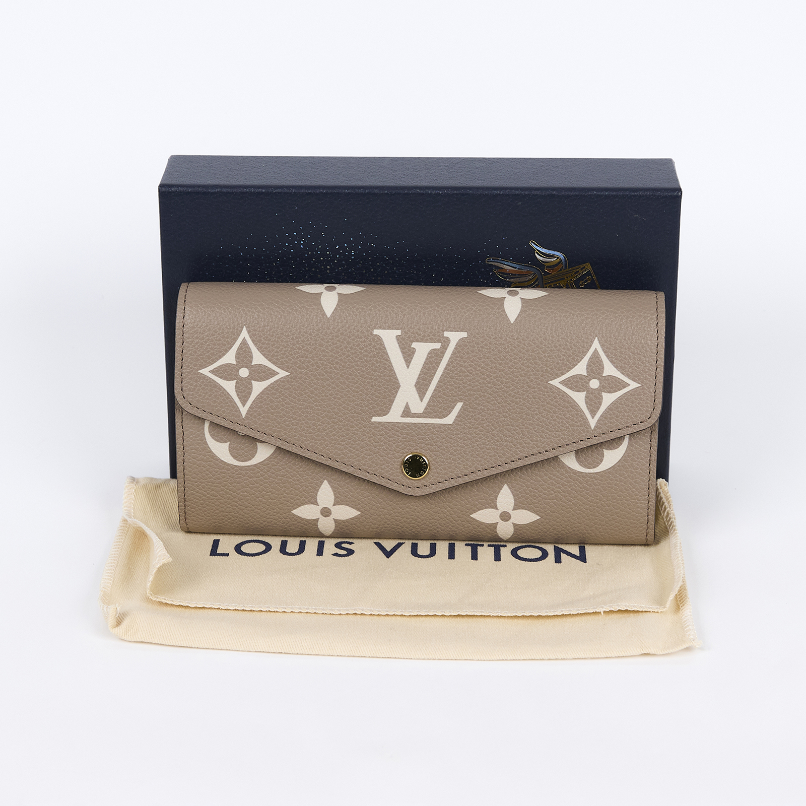 路易威登 LOUIS VUITTON Sarah 錢包 Reverse帆布 Empreinte柔軟粒面壓花牛皮 灰色 奶油色 M81049 晶片款  原廠盒子/防塵袋