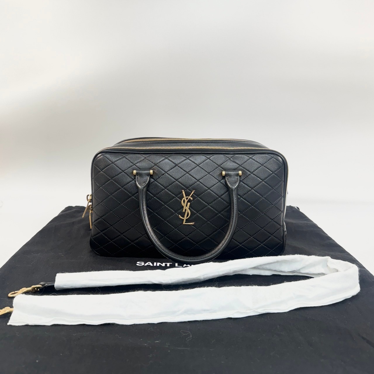 聖羅蘭 YSL SAINT LAURENT Liya Duffle Bag 波士頓包 保齡球袋 行李袋 7667851EL07 黑色兩用包 防塵袋/背帶