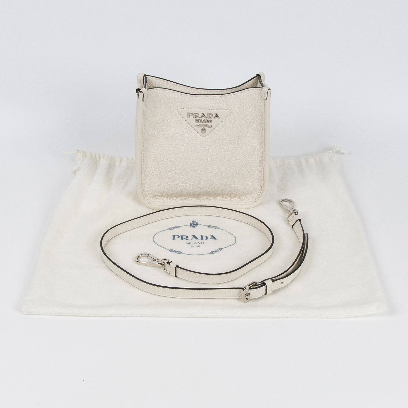 普拉達 PRADA 皮革 迷你 肩背袋 1BH191_2DKV 白側背包 防塵袋