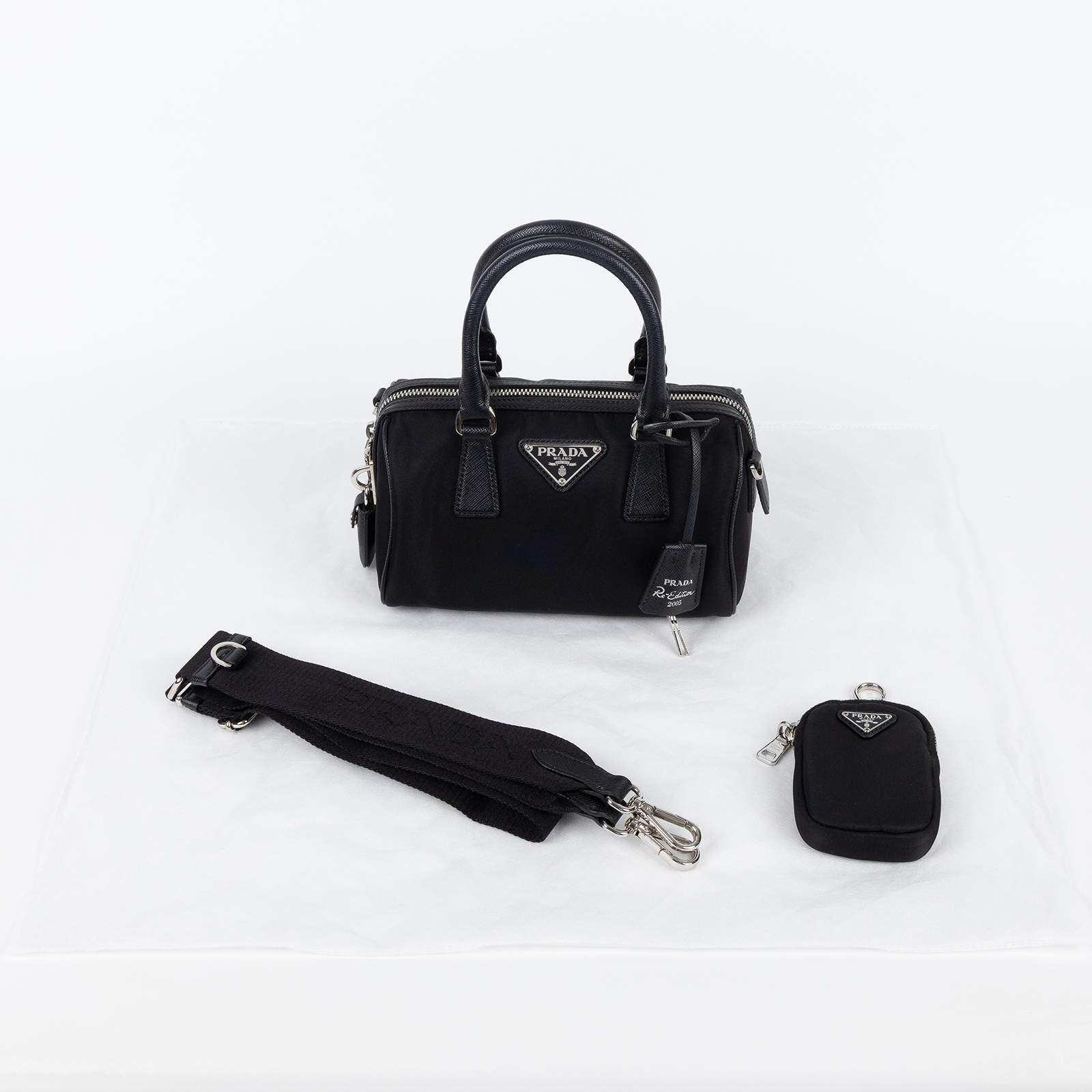 普拉達 PRADA Re-Edition 2005 Nylon 波士頓包 1BB846_064 黑尼龍波士頓包 背帶/小包/鎖組/鑰匙吊牌