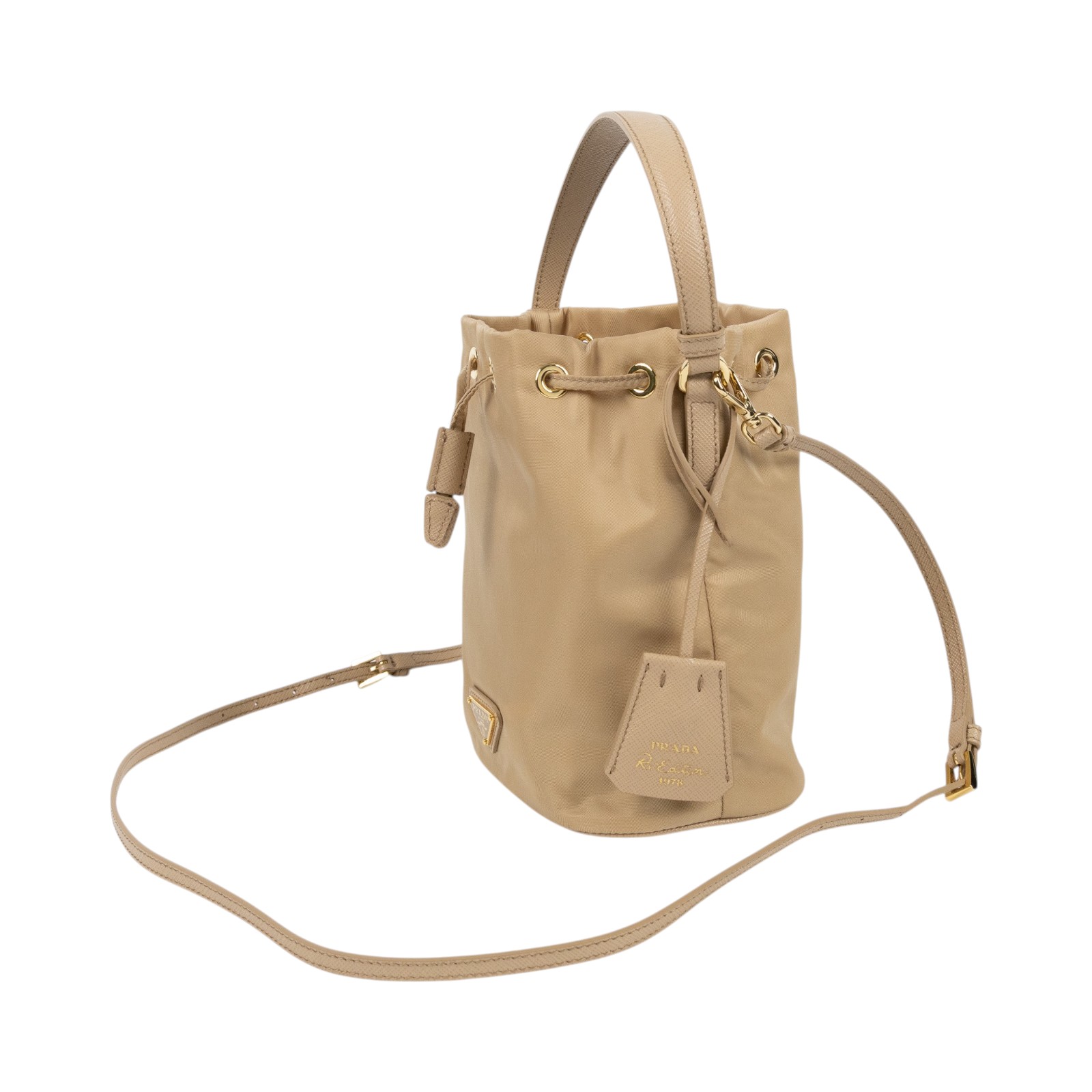 普拉達 PRADA Re-Edition 1978 Re-Nylon 迷你袋 1BE067_R064 奶茶迷你水桶包 防塵袋/背帶